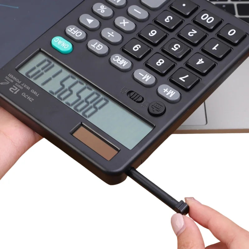 Close-up of calculator buttons and solar panel